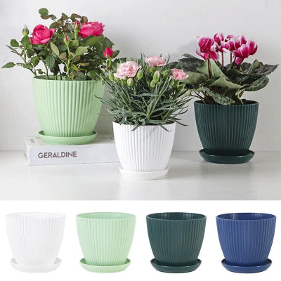 pots de fleurs striés bleu verte et blanc