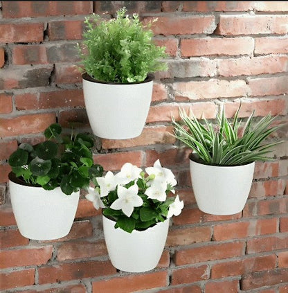 Pot de fleur mural jardin vertical sur mur brique